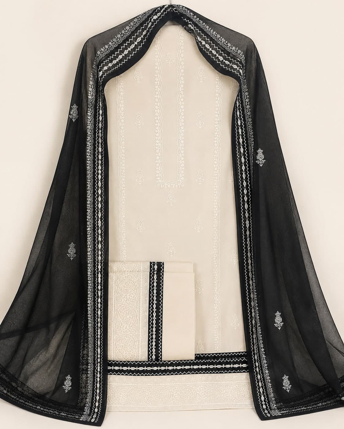 Ivory Noir — Ivory with black, hand embroidered by Ata-e-Zahra
